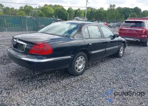 2001 Lincoln Continental из США, поврежденный, VIN 1LNHM97V41Y698608